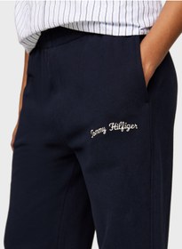 تصویر شلوار جین راحتی با کمر بلند و جزئیات لوگو برند Tommy Hilfiger High Waist Logo Detail Sweatpants