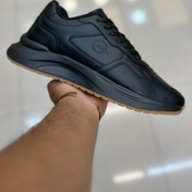 تصویر کتانی برشکا مردانه مشکی 