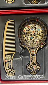 تصویر آینه و شانه فلزی 