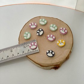 تصویر دکمه ی پنجه پیشی 