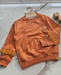 تصویر بلوز دورس نارنجی - سایز۵ 