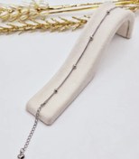 تصویر دستبند زنانه مدل توپی 