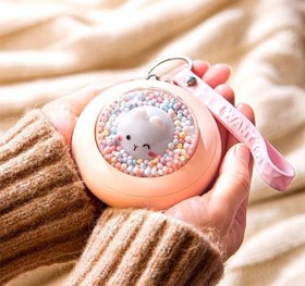 تصویر گرم کن دست hand warmer 