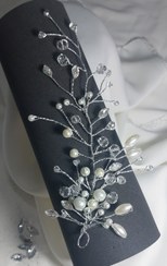 تصویر کنارسری بلند جنس سنگ و مروارید و انعطاف پذیر 