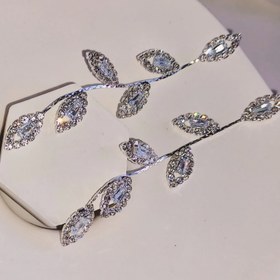 تصویر گوشواره زنانه جواهری برند فشن مدل برگ استیل رنگ ثابت Women's jewelry earrings, fashion brand, leaf model, fixed color steel