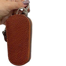 تصویر جاکلیدی دورزیپ - عسلی / فلوتر 