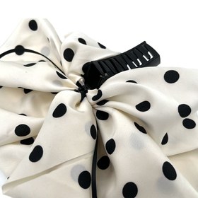 تصویر کلیپس پاپیون سفید خالدار 