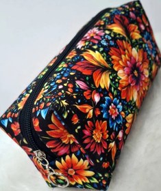 تصویر جامدادی دانشجویی مدل تک زیپ طرح سنتی 