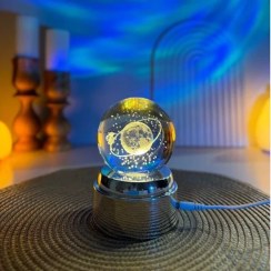 تصویر گوی کریستالی موزیکال طرح دختر و ماه قطر ۸ سانتی‌متر 