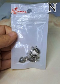 تصویر پلاک طرح برگ فلزی 