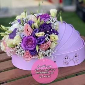 تصویر دسته گل و کیک تولد برای هدیه به خانواده نوزاد 