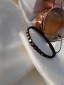 تصویر دستبند بافت اسپرت با سنگ حدید طلایی مناسب برای خانم ها و اقایان 