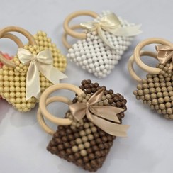 تصویر کیف مرواریدی دسته چوبی زنانه و دخترانه مدل فانتزی روبان‌دار - کرم pearl bag wood handle