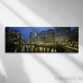 تصویر تابلو دکوراتیو Chicago River, Chicago, Illinois, USA,نمای زاویه پایین… اثر پانورامیک ایمجز - بوم گالری ایماژ / 120x40 / قاب 2x2 PVC سفید Low angle view of buildings lit up at night BY Panoramic Images