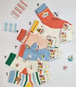 تصویر جوراب بچگانه گلبهی 