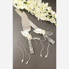 تصویر چاقو و کفگیر کیک تزیین شده پس کرایه 