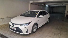 تصویر تویوتا کرولا مدل 2024 ا هیبرید موتور 1800 فول هیبرید موتور 1800 فول