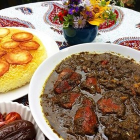 تصویر سبزی مرغ ترش سرخ شده ترکیب با مغز گردو ورب انار اماده طبخ گیلان.رشت 