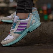 تصویر کتانی مردانه آدیداس ZX8000 رنگ مشکی طلایی با رویه چرم 