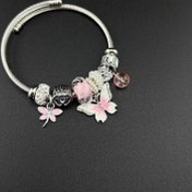 تصویر دستبند پاندورا پروانه سفید صورتی 