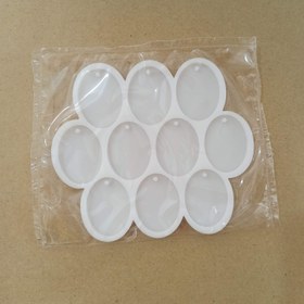 تصویر قالب سیلیکونی رزین مدل جاکلیدی و آویز طرح بیضی پین دار 3 در 4 سانتی متر Resin silicone mold for keychain and pendant, oval design with pins, 3 x 4 cm