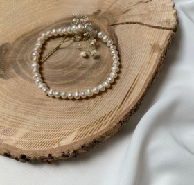 تصویر دستبند مروارید طبیعی باروک سفید قفل نقره 4 میلیمتر Pearl bracelet