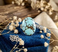 تصویر نگین فیروزه نیشابور عنکبوتی آبی کمرنگ طرح خاص 