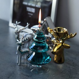 تصویر شمع روغنی مدل کریسمس ا Pine oil candles Pine oil candles