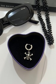 تصویر پیرسینگ گوش اسکلتی 