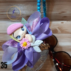 تصویر تل عروسکی 