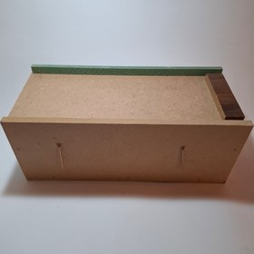 تصویر لونه چوبی مرغ عشق 