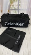 تصویر ساک ورزشی و مسافرتی سی کی – Calvin Klein – کلوین کلین – CK ک کیف جادار و فوق العاده شیک، زیبا و سبک این ساک دارای یک شوزبگ (Shoes Bag) جداگانه میباشد یک بند دستی متوسط دارد و یک بند دوشی بلند قابل تنظیم