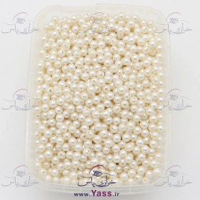 تصویر مروارید پلاستیکی دوختنی کرم نباتی سایز 6 (بسته 20 گرمی) 