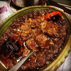 تصویر گمج (ظرف سفالی گیلانی) یک مرغه 