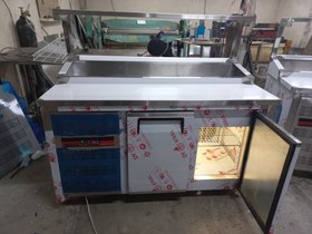 تصویر تاپینگ 120 زیر یخچال 