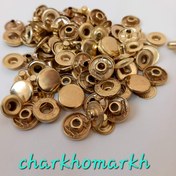 تصویر دکمه پرسی میانه طلایی 