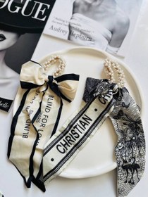 تصویر کش پاپیون مرواریدی 