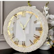 تصویر ساعت دیواری رزینی سفید طلایی طرح عروس قطر80 