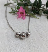 تصویر گردنبند و گوشواره توپی ست - نقره ای 