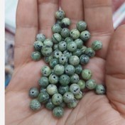 تصویر مهره سنگ یشم کانادا سایز 6 سوراخ دار سنگ اصل طبیعی 