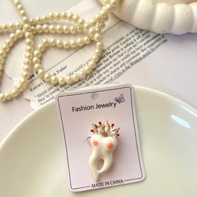 تصویر گل سینه دندان تاج نگینی 