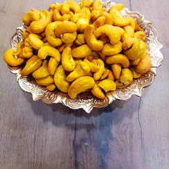 تصویر بادام هندی زعفرانی شور درشت ۵۰۰ گرم 