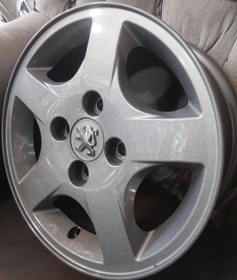 تصویر رینگ فابریک سایز۱۴(۱۰۸×۴) نقره‌ای ترنادو نیریز دودی Original wheel size 14"(4×108) Tornado Neyriz HB 207