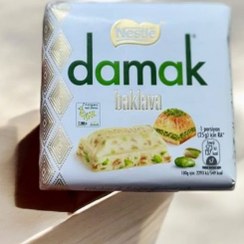 تصویر شکلات سفید باقلوایی داماک شکلات و فرآورده های کاکائویی Nestle Damak 25 گرم