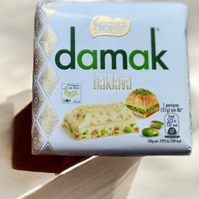 تصویر شکلات سفید باقلوایی داماک شکلات و فرآورده های کاکائویی Nestle Damak 25 گرم