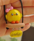 تصویر آویز ماشین جوجه لات براق 