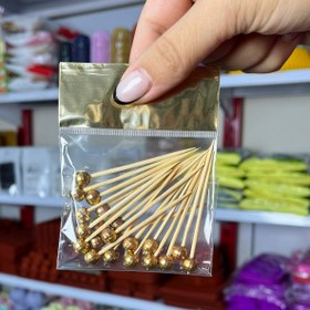 تصویر خلال فینگرفود مرواریدی - طلایی 