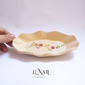 تصویر بشقاب بیضی دفرمه بتنی 