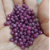 تصویر مهره سنگ یاقوت قرمز سایز4 تراش جواهری سنگ صددرصد طبیعی اصل معدنی دو طرف سوراخ دار 