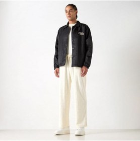 تصویر شلوار ورزشی با جزئیات مونوگرام برند استارتر برند starter Starter All-Over Monogram Detail Track Pants with Drawstring Closure and Pockets